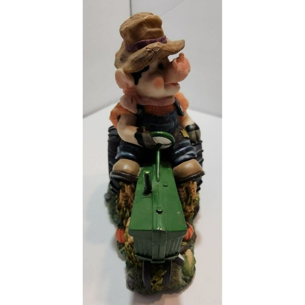 Jenkins Figurine 50737 Farmer Cow On A Green Tractor
